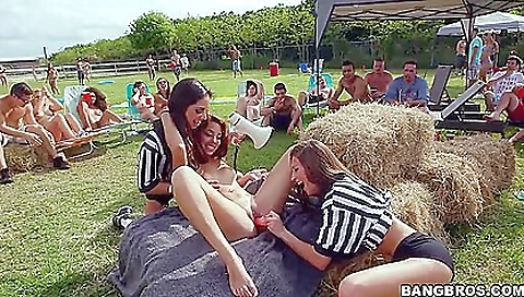 Sexy women enjoying outdoor lesbian sex on the lawn