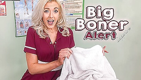 Nurse masturbating with sex toy in bed on top of a bed