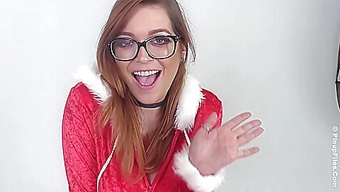 Redheaded blonde babe in stockings gets ready to enjoy