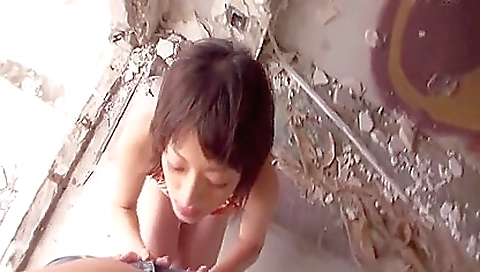 Asian chick is outdoors and has a big natural tits