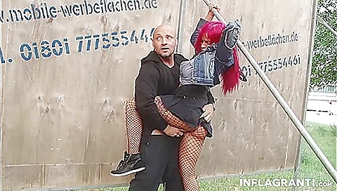 Sexy redhead with a hot body is showing off her body