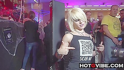 Blonde is having fun with her friends in the public area