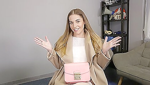 Busty brunette masturbates with a toy in high heels