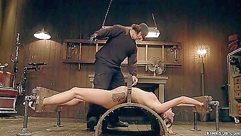 Blonde with gas mask getting a dildo and a vibrator