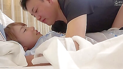 Japanese brunette is playing with her boyfriend's cock