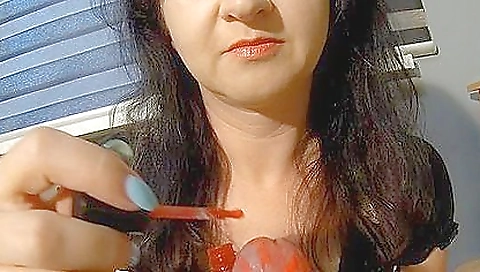 Blonde babe gets a cumshot in her hands after a handjob