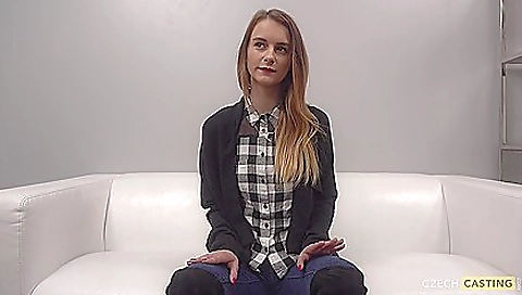 Adela is getting a facial in front of a black cast