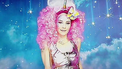 Sexy teen wearing sexy stockings and lingerie fingers a dildo